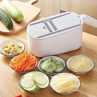 Artifact Vegetable Cutting Shredder.